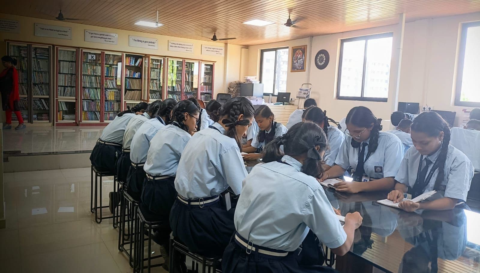 Students reading in the school library